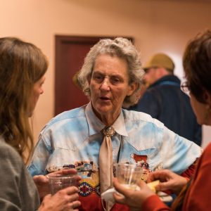 Dr. Temple Grandin visits with Maddy Butcher and Dr. Sheryl King